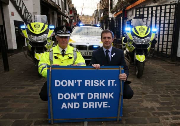 Justice Secretary Michael Matheson(r) joins Police Scotland Assistant Chief Constable Bernard Higgins as Police Scotland launches its annual festive drink-drive campaign. Picture:  Andrew Milligan/PA Wire
