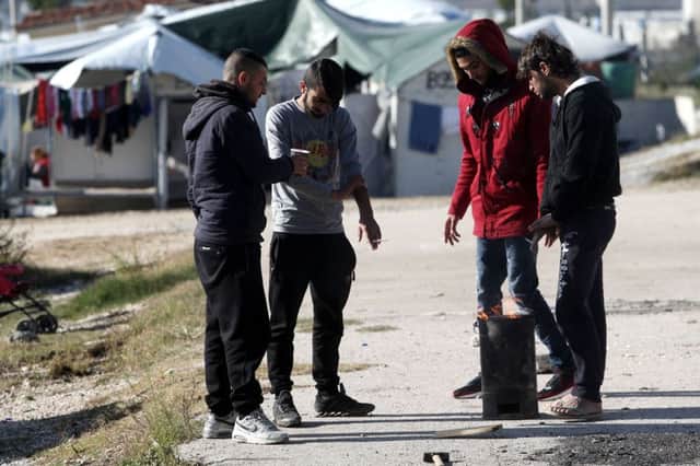 Refugees who fled Syria for camps in Greece were among those resettled in the UK.  AFP PHOTO / SAKIS MITROLIDISSAKIS MITROLIDIS/AFP/Getty Images