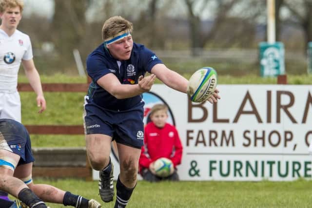 Dollar Academy's
Euan McLaren in action for Scotland U18