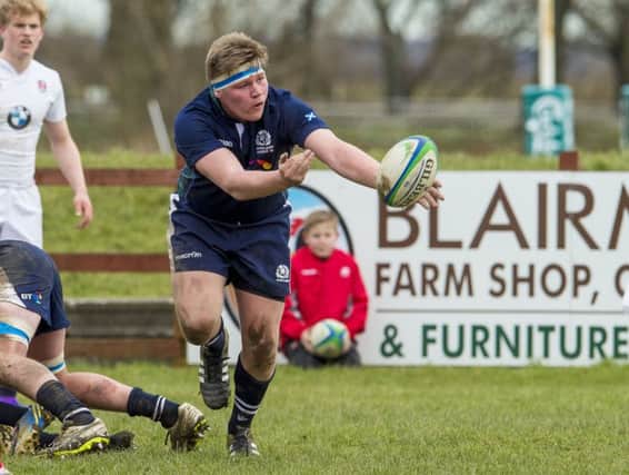 Dollar Academy's
Euan McLaren in action for Scotland U18