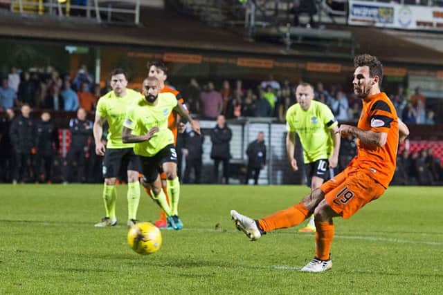 Dundee United's Tony Andreu rolls home the penalty to put the home side in front. Picture: Ross Parker/SNS