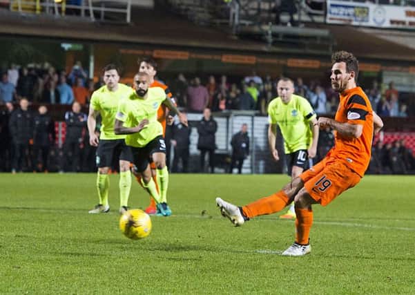 Dundee United's Tony Andreu rolls home the penalty to put the home side in front. Picture: Ross Parker/SNS