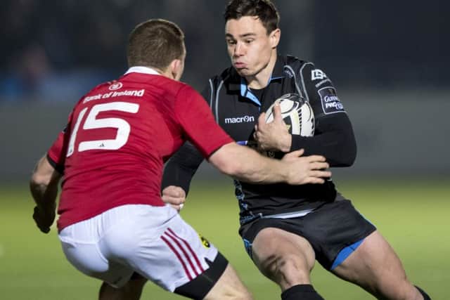 Glasgow Warriors' Lee Hughes takes on Andrew Conway. Picture: Gary Hutchison/SNS/SRU