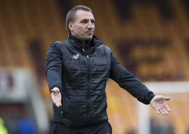Celtic manager Brendan Rodgers celebrates his side's 4-3 win over Motherwell at Fir Park. Picture: Alan Harvey/SNS