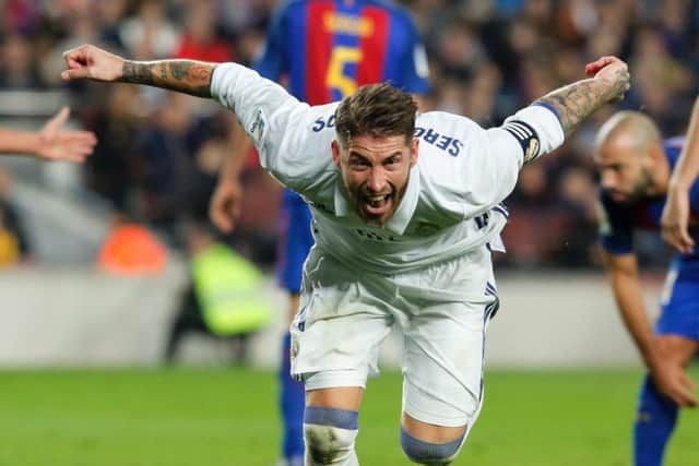 Real Madrid's Sergio Ramos celebrates his late equaliser against Barcelona. Picture: Pau Barrena/AFP/Getty Images