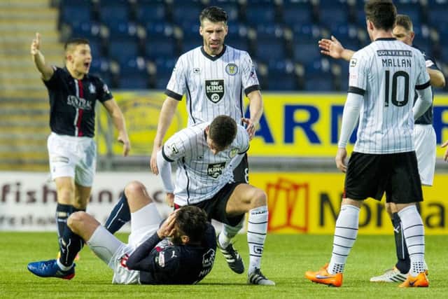 St Mirrens Jack Baird, centre, was unsurprisingly sent off in this incident for punching Lee Miller. Pic: SNS
