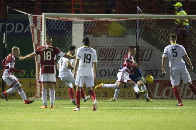 Partick Thistle's Sean Welsh (centre) scores to make it 1-1 at the SuperSeal Stadium. Picture: Bill Murray/SNS