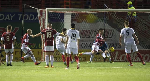 Partick Thistle's Sean Welsh (centre) scores to make it 1-1 at the SuperSeal Stadium. Picture: Bill Murray/SNS