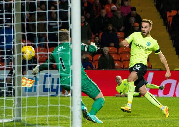 Andrew Shinnie goes close during Hibs' defeat by Dundee United. Picture: Ross Parker/SNS