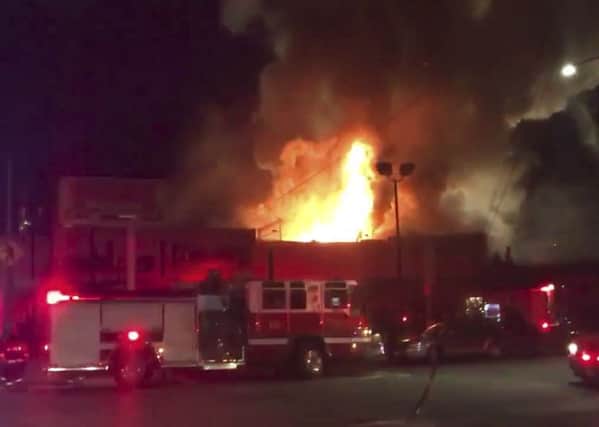 The blaze began at about 11:30 p.m. on Friday during a party at a warehouse in Oakland. Picutre: @Oaklandfirelive via AP