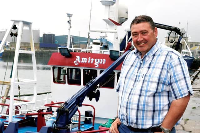 Responsibility comes with the job for Jimmy Buchan of Amity Fish Company. Pic: Duncan Brown.