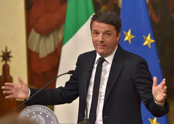Italy's Prime Minister Matteo Renzi announces his resignation following the results of the vote for a referendum on constitutional reforms. Picture AFP Andreas Solaro.