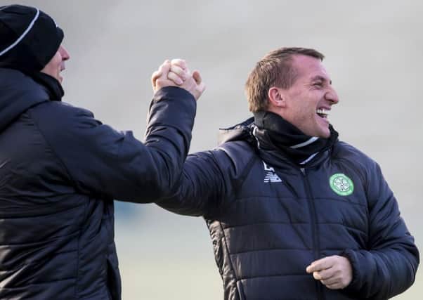 Manager Brendan Rodgers in relaxed mood as Celtic train at Lennoxtown before heading south for their Champions League tie at Manchester City.