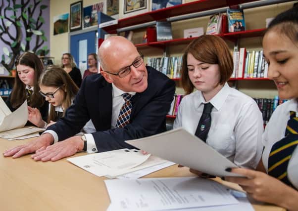 John Swinney is pressing on with further change in schools after a challenging picture of current standards was unveiled yesterday.