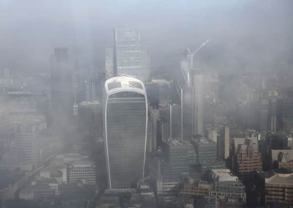 Brexit clouds are gathering over the finance sector, a major contributor to government coffers. Picture: Dan Kitwood/Getty Images