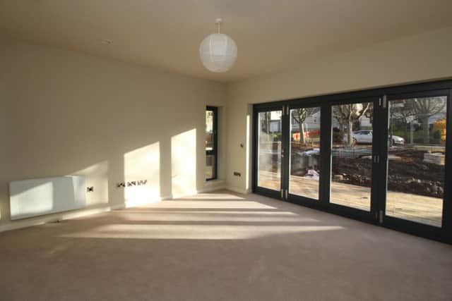 The sitting room with bifold doors