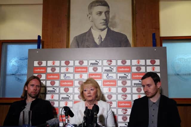 New Heart of Midlothian manager Ian Cathro (right) assistant manager Austin MacPhee (left) and owner Ann Budge. Picture: PA