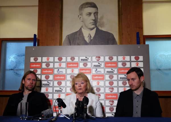 New Heart of Midlothian manager Ian Cathro (right) assistant manager Austin MacPhee (left) and owner Ann Budge. Picture: PA