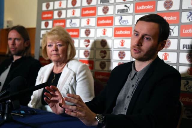 Ian Cathro (right) speaks at his opening press conference as Hearts boss. Picture: PA