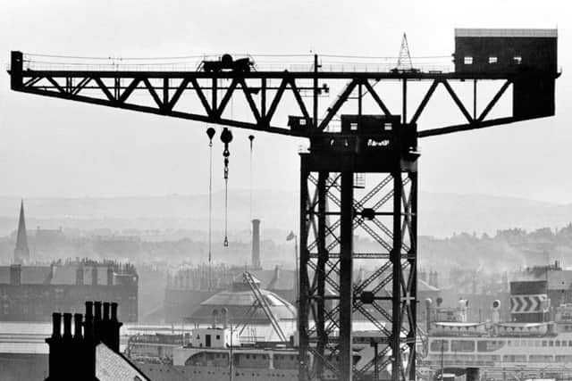 The Finnieston crane pictured in 1955. It was completed in 1931 to serve the Queen's Dock, which is now infilled and is the site of the SECC. Picture: CSG CIC Glasgow Museums & Libraries