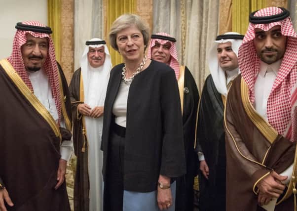 Prime Minister Theresa May, here meeting King Salman bin Abdulaziz al Saud of Saudi Arabia, has been ranked as one of the world's most powerful people. Picture: Stefan Rousseau/PA Wire