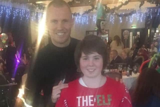 Kenny Miller joins children at their Christmas Party. Picture: Contributed