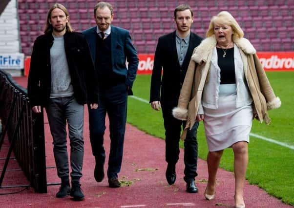 New head coach Ian Cathro, second right, and his assistant Austin MacPhee, left, with Hearts owner Ann Budge and chief operating officer Scot Gardiner. Picture: SNS Group
