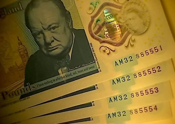 The public are being urged to check their new fivers after engraved bank notes worth as much as £50,000 were circulated. Picture: SWNS