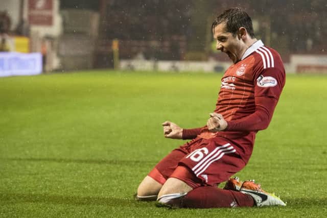 Aberdeen midfielder Peter Pawlett celebrates his opener as Derek McInnes' side claimed an emphatic win over Kilmarnock. Picture: SNS Group