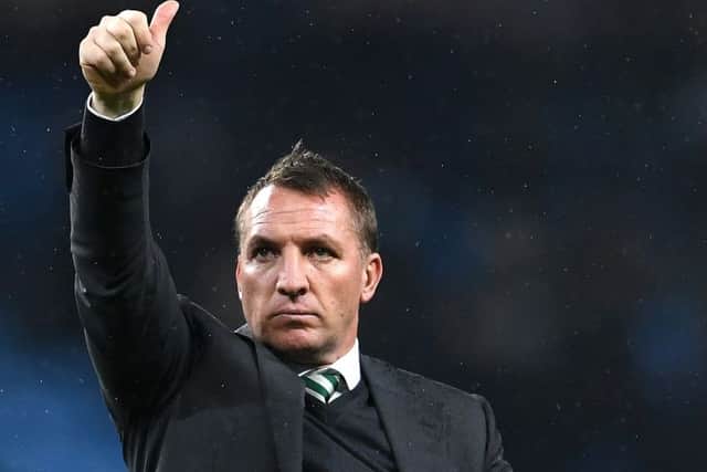 Brendan Rodgers signals to the Celtic fans during the Champions League draw with Manchester City. Picture: Laurence Griffiths/Getty Images