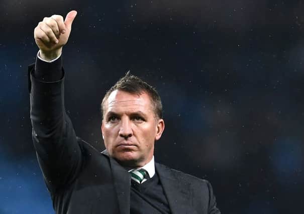 Brendan Rodgers signals to the Celtic fans during the Champions League draw with Manchester City.  Picture: Laurence Griffiths/Getty Images