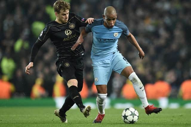 Stuart Armstrong, pictured here battling with Fernando, had another terrific night for Celtic. Picture: AFP