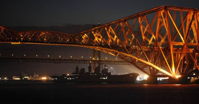 HMS Illustrious leaves the Forth Estuary for the last time. Picture: Toby Williams