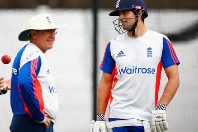 England captain Alastair Cook, right, insists he and coach Trevor Bayliss, left, are in agreement over the style of batting required. Picture: Julian Finney/Getty Images