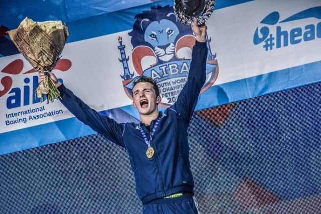 Lanarks Willie Hutchison celebrates becoming the first Scot ever to win a World Youth Championship boxing title.
