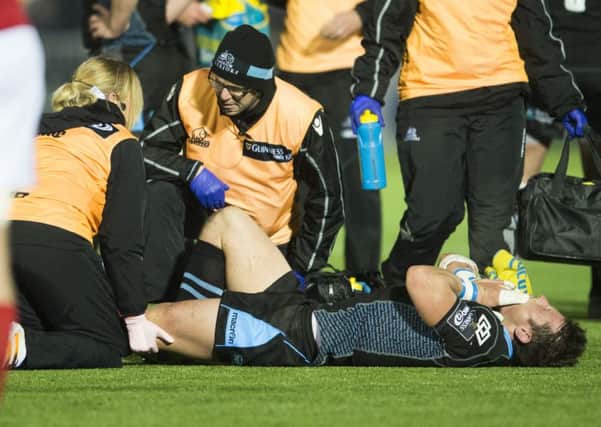 Glasgow Warriors' Peter Horne receives treatment against Munster. Picture: Bill Murray/SNS