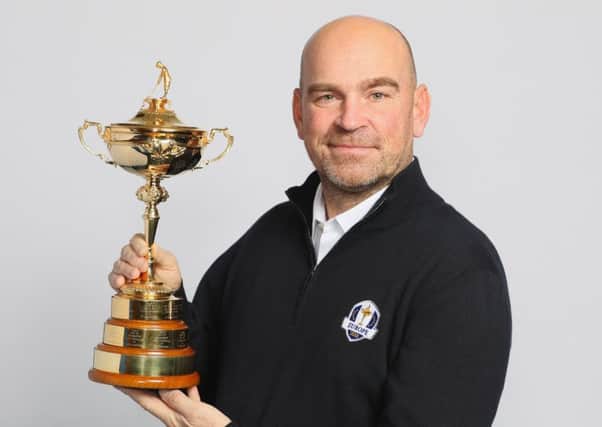 Thomas Bjorn poses with the Ryder Cup trophy when he was named 2018 European captain. Picture: Andrew Redington/Getty Images