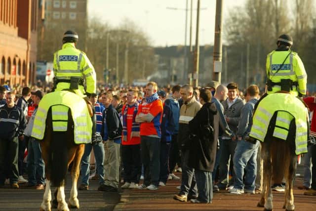 Two mounted police officers control the crowds outside Ibrox.
Picture: Submitted
