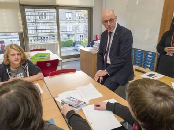 John Swinney has proposed the changes to reverse the fall in standards