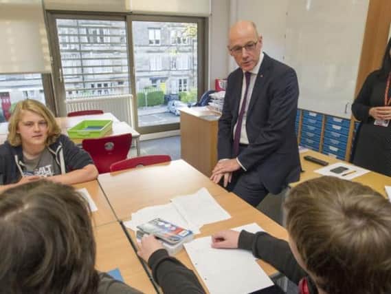 John Swinney has proposed the changes to reverse the fall in standards