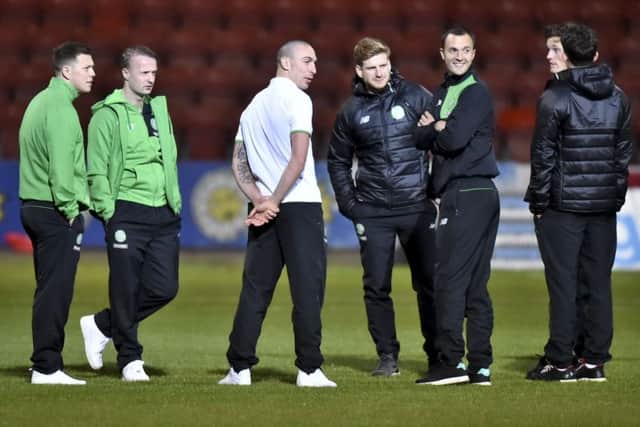 Leigh Griffiths, second from left, with some of the Celtic squad ahead of this evening's match against Partick Thistle at Firhill. Picture: Rob Casey/SNS