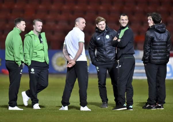 Leigh Griffiths, second from left, with some of the Celtic squad ahead of this evening's match against Partick Thistle at Firhill. Picture: Rob Casey/SNS