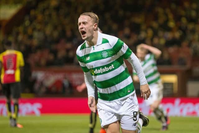 Leigh Griffiths wheels away having put Celtic 3-0 up. Picture: PA
