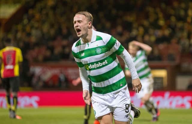 Leigh Griffiths wheels away having put Celtic 3-0 up. Picture: PA