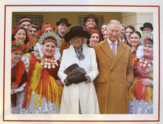 The Duke and Duchess of Cornwall's 2016 Christmas card on a Christmas tree in Clarence House, London. Picture; PA