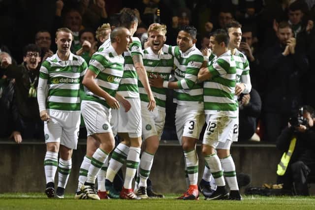 Stuart Armstrong, centre, celebrates his second goal with his team-mates during Celtics 4-1 defeat of Partick Thistle at Firhill on Friday night. Picture: Rob Casey/SNS