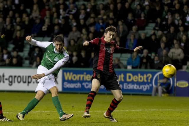 Hibernian's Brian Graham, left, scores his side's second goal of the afternoon.
Picture: Alan Rennie/SNS