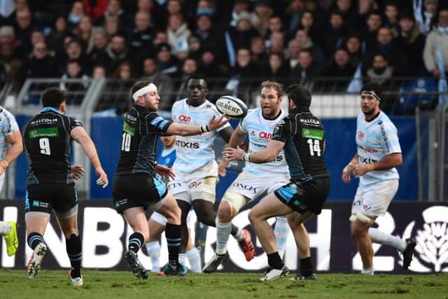 Finn Russell who controlled the game from Number.10 passes to Tommy Seymour. Picture: Getty Images