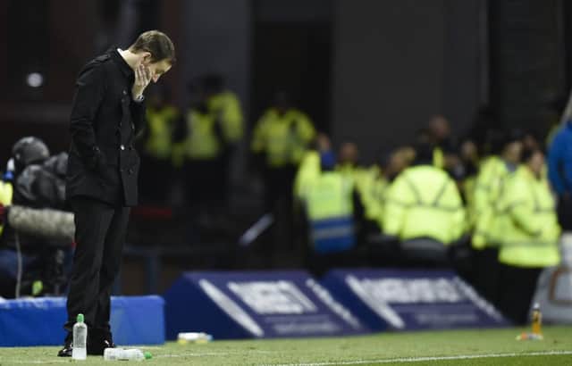 Dejection for Hearts manager Ian Cathro as his side lost 2-0 at Ibrox. Picture: Rob Casey/SNS