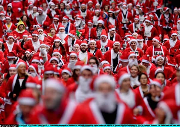 The Santa Dash has been held since 2006 and this year is the 10th anniversary event, in total the event has raised over Â£100,000 for charities working in and around Glasgow.
Picture:  Getty Images